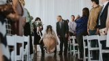 After being paralyzed in freak accident, bride walks down aisle, dances at wedding