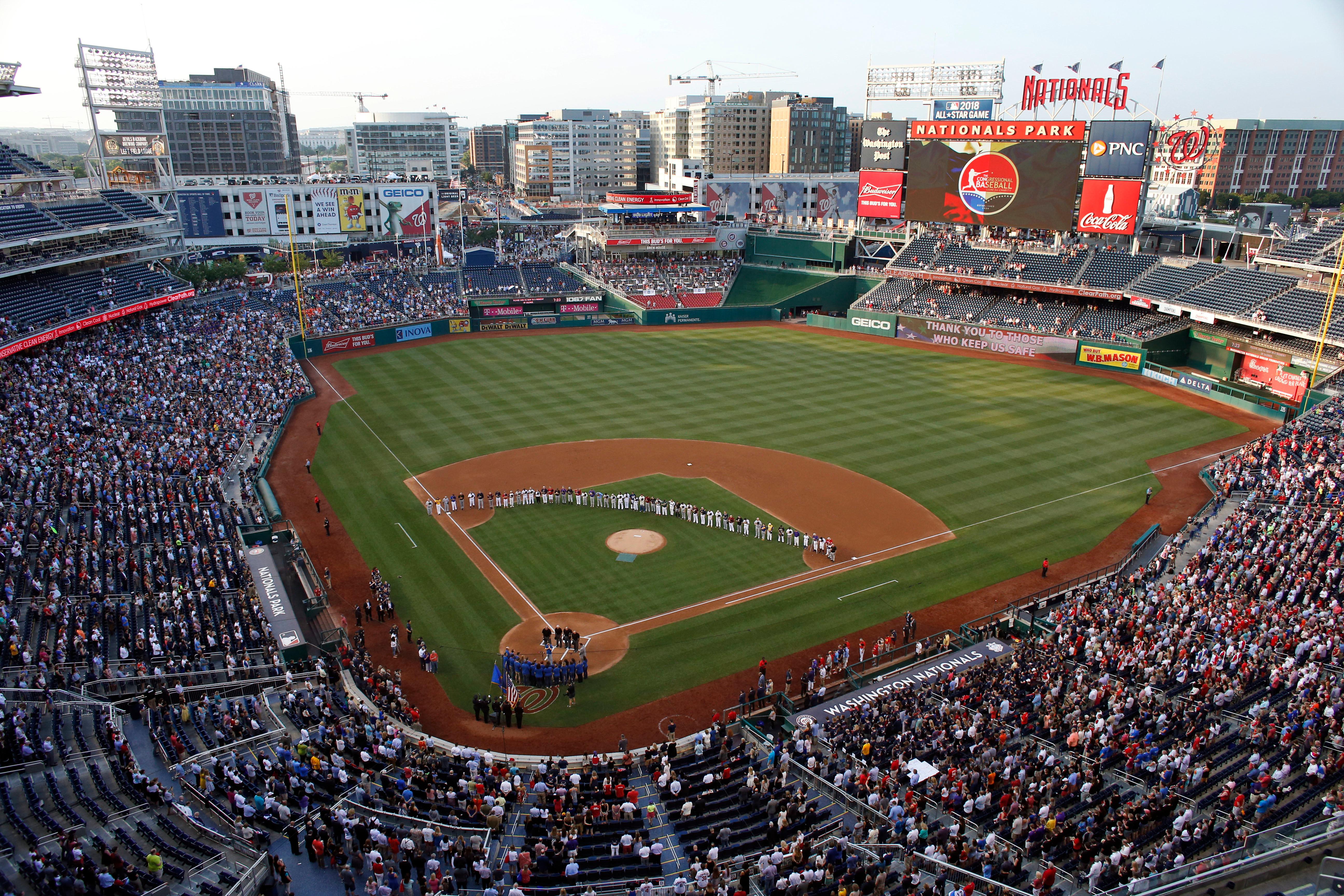 capitol police officer injured in shooting throws 1st pitch at